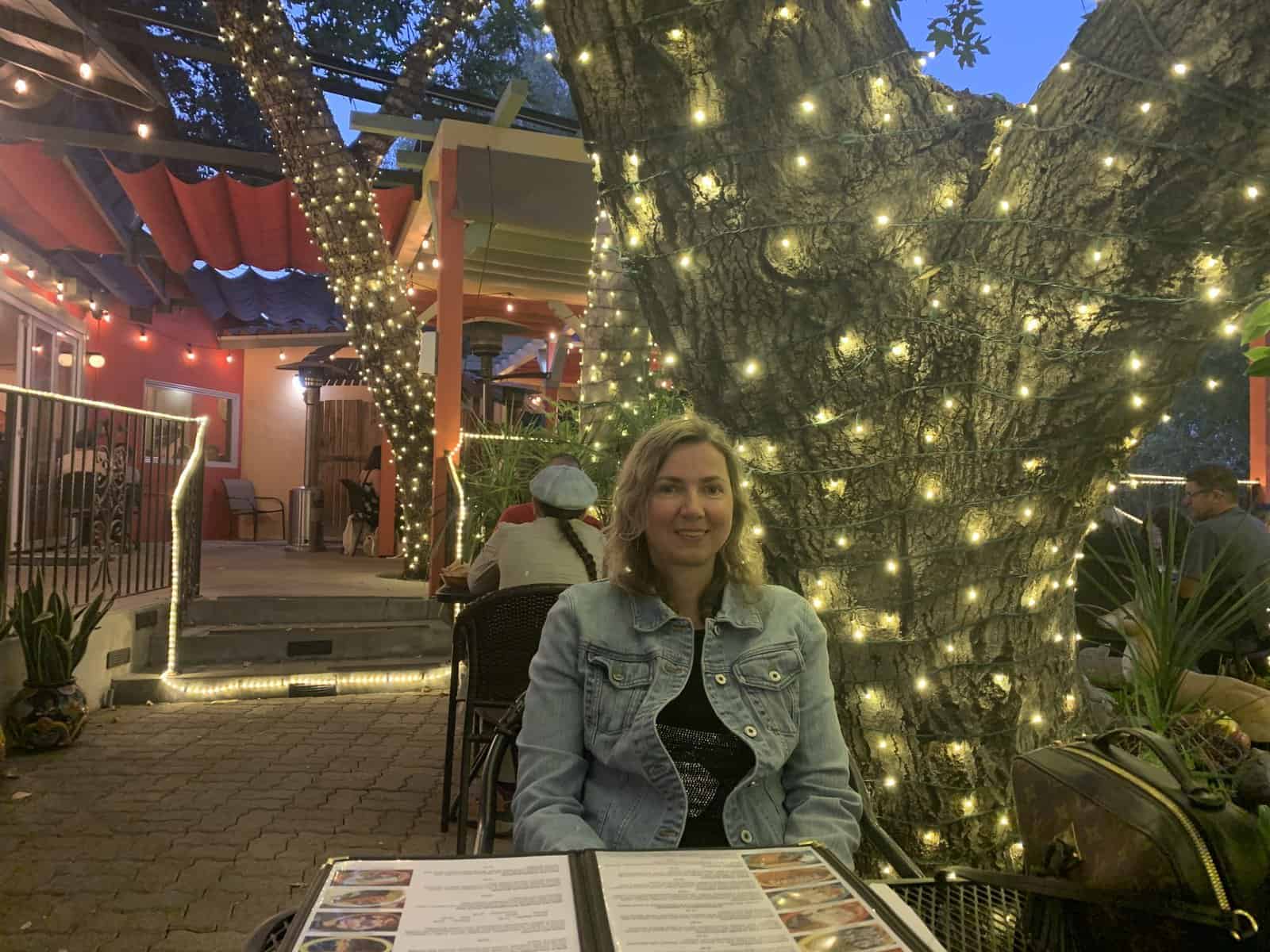 Me sitting under the trees at Rose Canyon Cantina