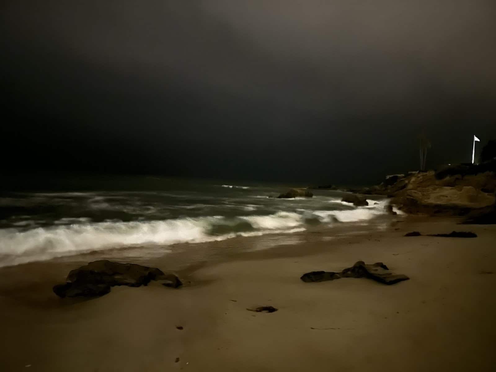 dark ocean at night in Laguna Beach