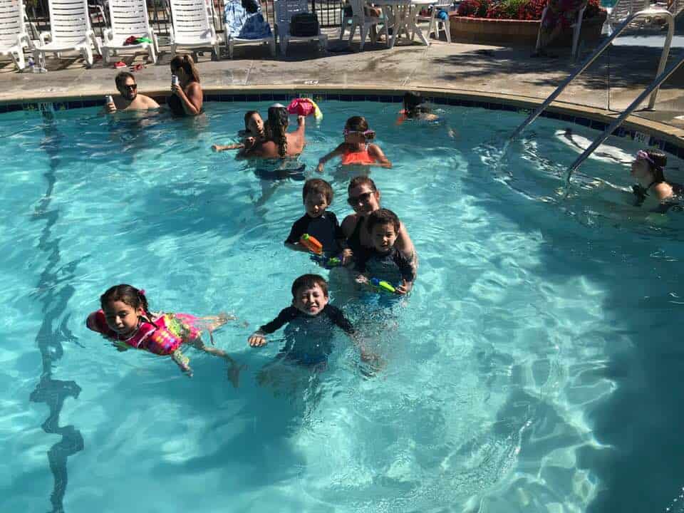 enjoying the pool with kids at Campland