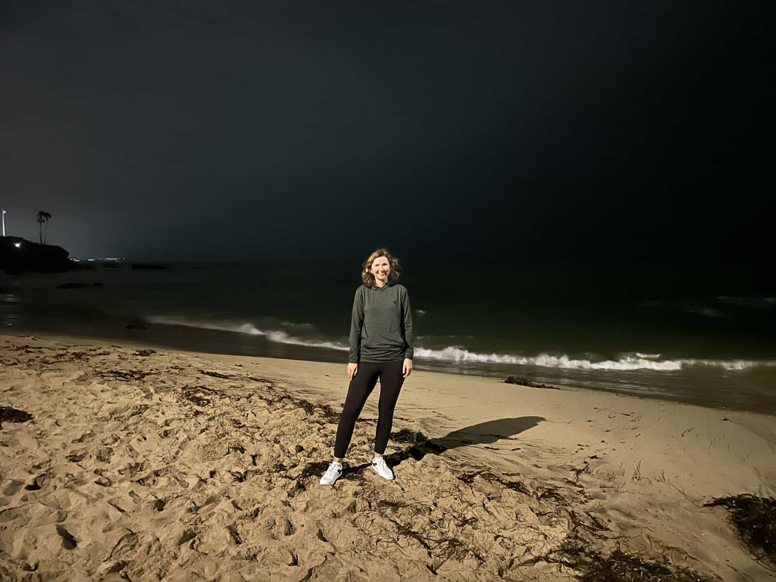 me at night by the ocean in Laguna Beach