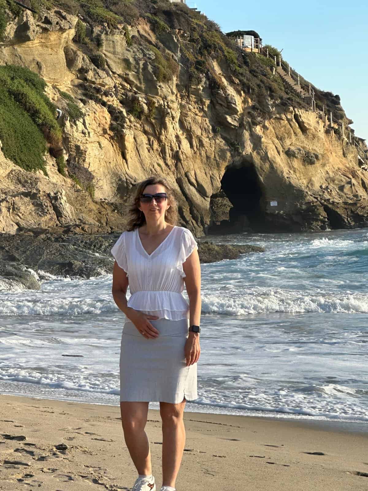 me standing near the sea cave at Thousand Steps beach