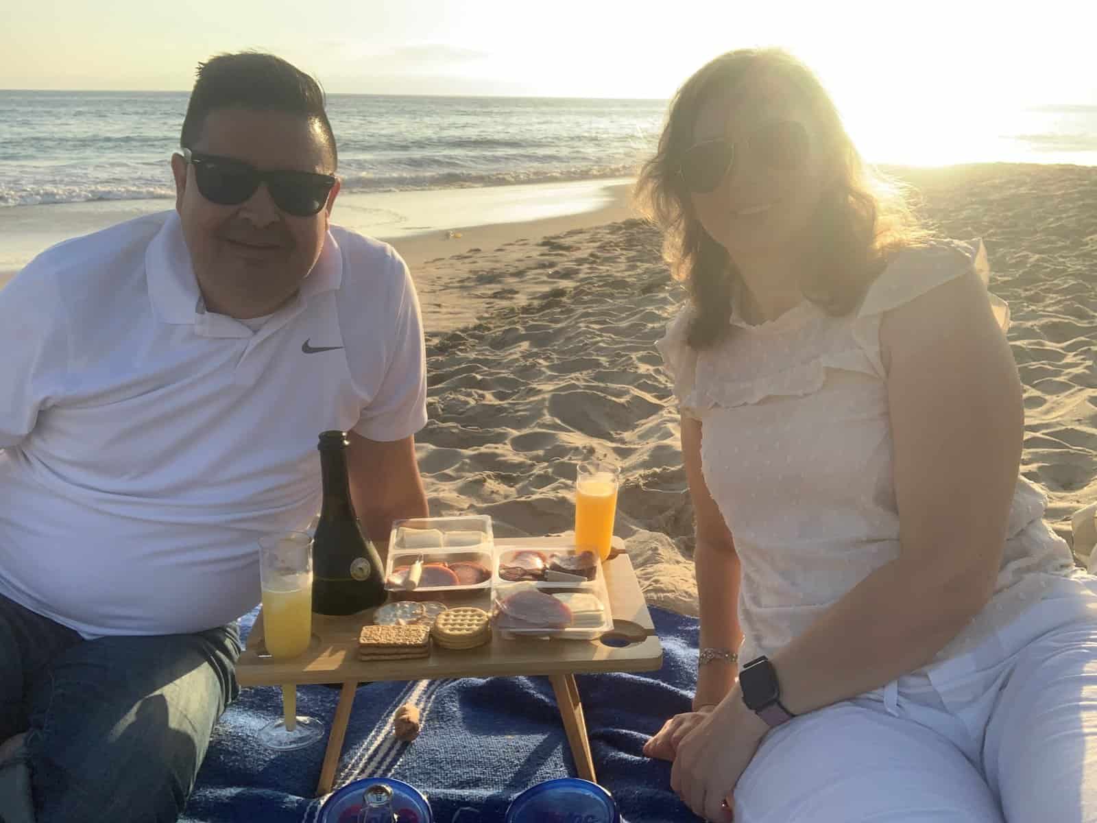 our picnic food with mimosas at the beach