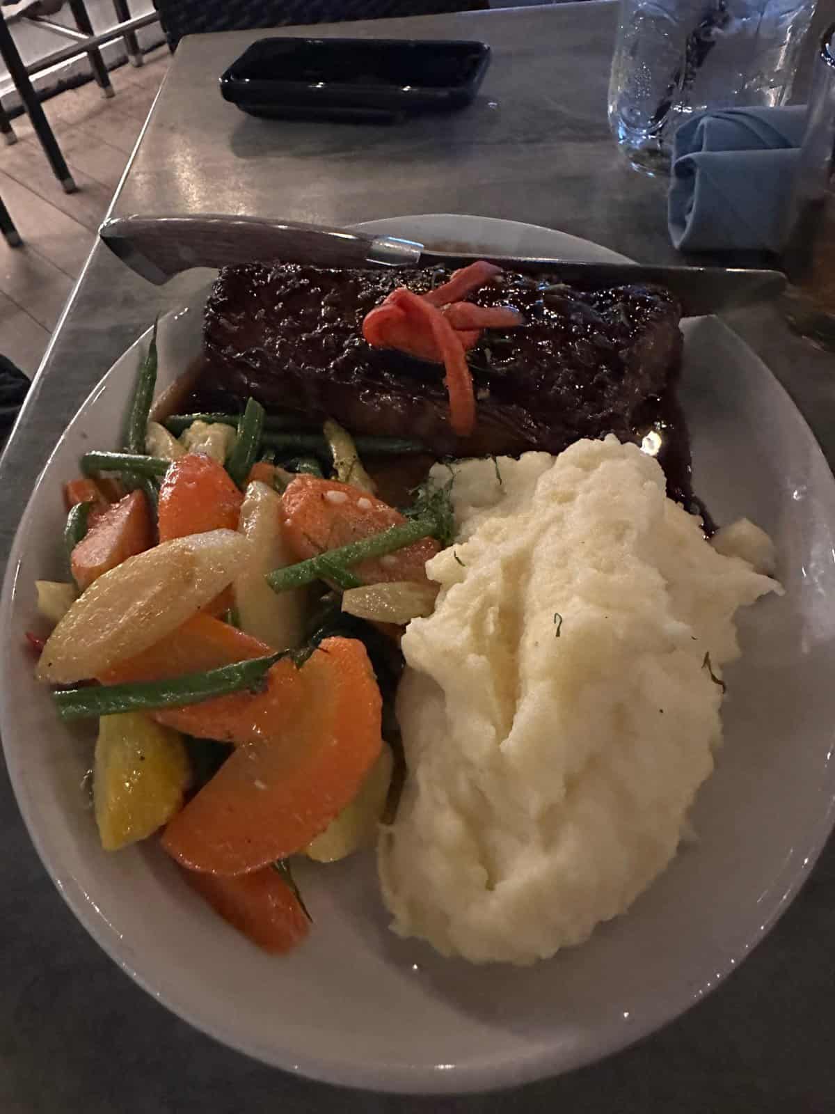 My boyfriends New York steak at the Deck restaurant