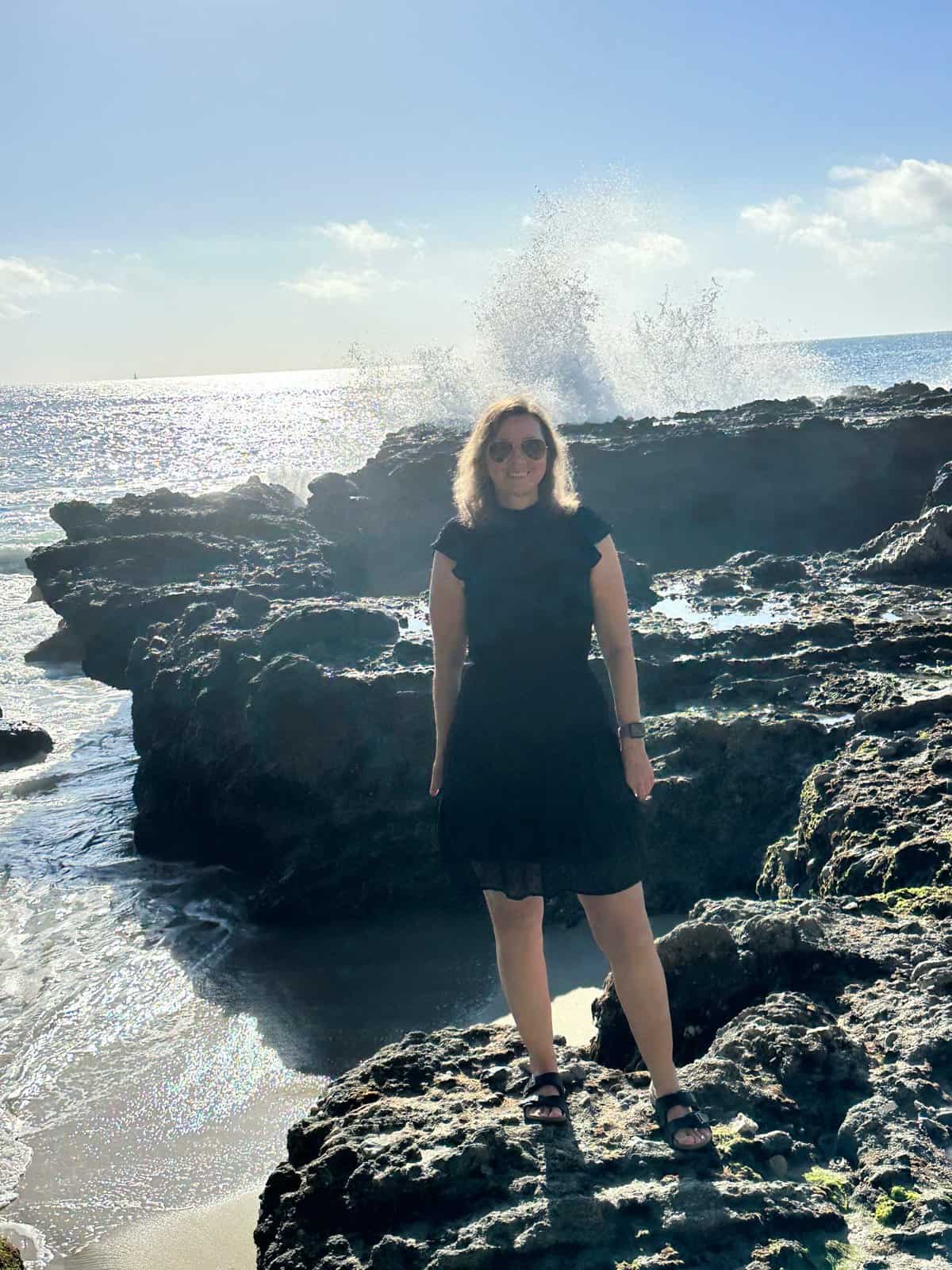 me standing ny the rocks at Victoria beach