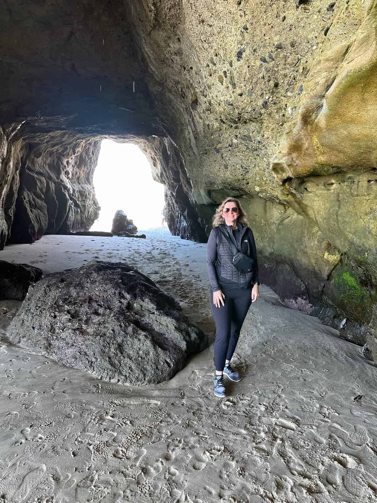me standing in the cave at 1000 steps beach
