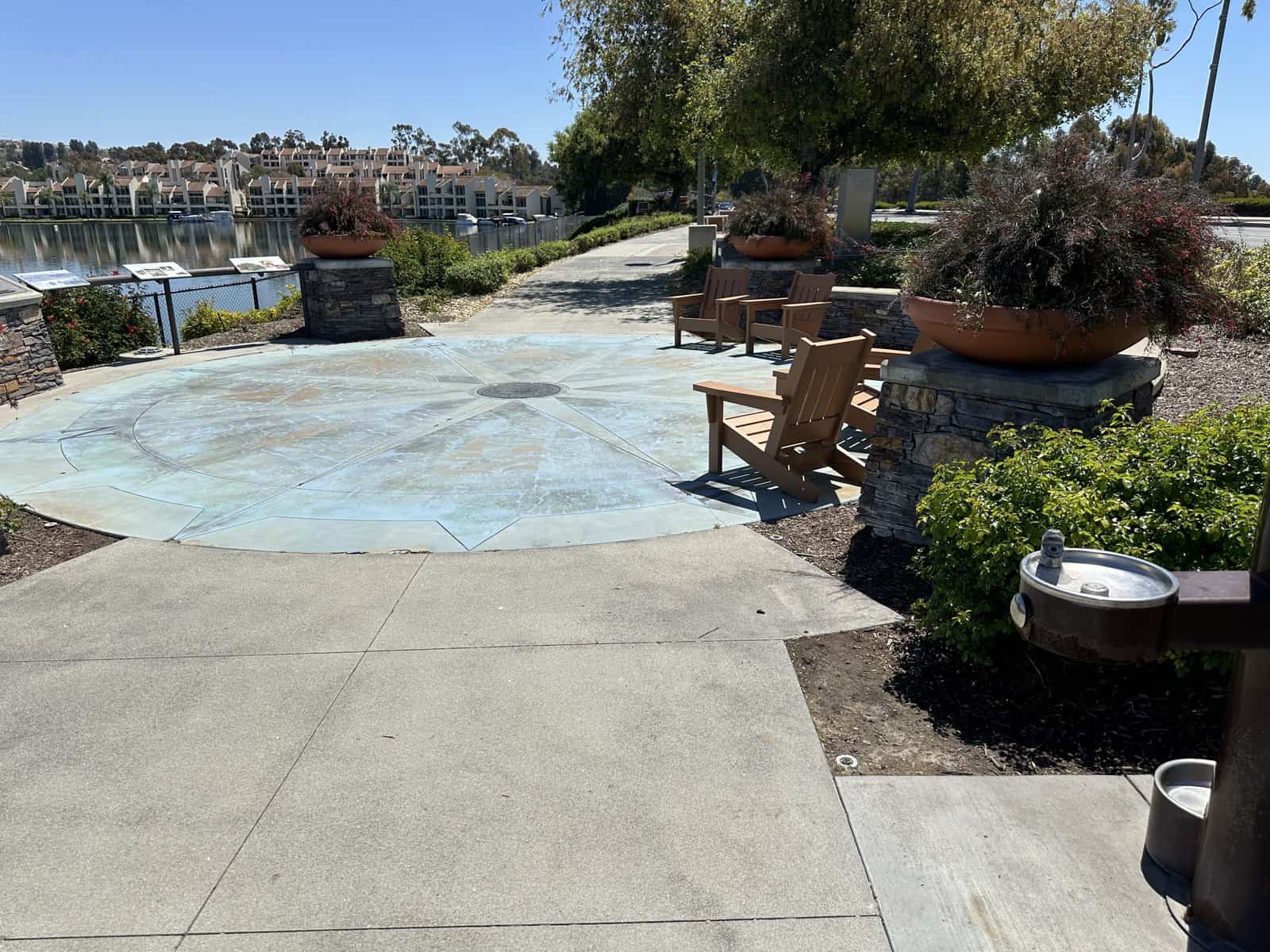 beautiful view area with benches and signs where you can learn more about the lake